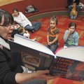 WARMTH IN THE WRITTEN WORD: Sue Ann Pekel, children’s librarian at the Bentonville Public Library, r...