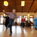 Ron Foldvary teaches a line dancing class at the Fayetteville Senior Center on Tuesday. The group is...