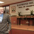 Arkansas quarterback Ryan Mallett smiles after talking with reporters and announcing his decision to...