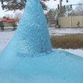 A fountain at Turtle Creek Apartments II at 24th and Olive streets is frozen artwork sculpted by the...