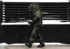 A Detroit Police Department bomb squad member carries a suspicious envelope left outside the Theodore Levin United States Courthouse in Detroit, Friday, Jan. 8, 2010. Umar Farouk Abdulmutallab, the Nigerian suspect who allegedly tried to set off an explosive device aboard Northwest flight 253, pleaded not guilty at the courthouse to charges of trying to ignite a chemical-laden explosive on the U.S. airliner on Christmas Day.  