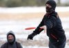  Arkansas Democrat-Gazette/WILLIAM MOORE
Bundled up for sub-freezing temperatures, Doug Duff of Tulsa makes his putt on the 18th hole during the North Shore Ice Bowl Saturday, January 9, 2009 at the North Shore Disc Golf Course near Lake Fayetteville in Fayetteville.  The bowl, which was organized by the Fayetteville Disc Golf Association and run through the Professional Disc Golf Association, raised money for the Northwest Arkansas Food Bank.  There will be other Ice Bowls held in February, including the Horseshoe Canyon Ice Bowl February 27 Horshoe Canyon Ranch in Jasper, and the 4th Annual Fort Smith Ice Bowl February 6 and 2nd Annual Super Class Fort Smith Ice Bowl February 7 at Tilles Park in Fort Smith.
