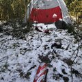 A tent set up in the woods on Thursday of south Fayetteville has a beer can littering the nearby gro...
