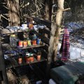 A makeshift pantry anchors a tent encampment Thursday where homeless persons stay in south Fayettevi...