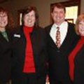 Saving Grace founders Becky and Kent Shaffer, center, are joined by board member Karen Weiler, left,...