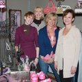 Saving Grace volunteers Jaclyn Williams, from left, Gwen Wiley, Jan Shinall and Jayci Schmitt gather...