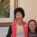 Artist Leilani Law, left, visits with Sophia Calzada on Thursday evening.