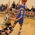 Cassie Trexler of Springdale Central, right, goes up for a shot as Bentonville players Morgain Spych...