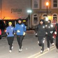 A group of runners leaves the Bentonville Square on a 1-hour training run in 5-degree weather at 7 a...