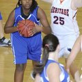 Rogers High’s Taylor Strickland, left, looks to pass the ball as Heritage’s Lacey Murray defends dur...