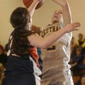 Springdale Central’s Ashley Gray, right, takes a shot as Southwest’s Anna Hudgeons defends during Mo...