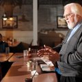Author Tom Gnagey speaks to a meeting of the Whodunits Mystery Club on Saturday at the AQ Chicken Ho...