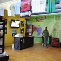 Brian Bailey, manager of the Fayetteville Visitors Center, walks through the store Tuesday.
