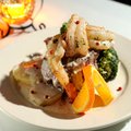 The Filetto alla Mafia, a center-cut filet stuffed with shrimp and green peppercorns in a cognac cre...