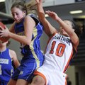 Rogers Heritage’s Yalile Johnson fails to grab a rebound as Harrison’s Molly Brashers grabs the ball...