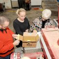 Cris Henry, from left, Jennifer Sprenger and Paulette Roos count votes Saturday for three positions ...
