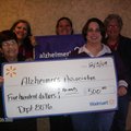 WALMART DONATION Members of Wal-Mart’s Shared Financial Services division are pictured with Northwes...