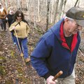 Al Knox, right, trails maintenance supervisor at Hobbs State Park, leads a group of hikers Saturday ...