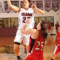Siloam Springs’ Ashley Adams attempts a shot over Vilonia’s Catherine Puckett on Friday at Panther A...
