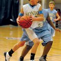 HOOP DREAMS Sonics’ Mason Collins drives to the basket as a Helen Tyson Middle School Sonic defends ...
