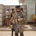 Walter Bryan Jackson is on patrol at a gasoline station in Iraq. He was awarded the Army’s Distingui...