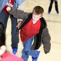 A GOOD SKATE  Jason Moffett, 6, and his mother Jana Moffett try ice skating for the first time at th...
