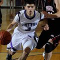 Fayetteville’s Kikko Haydar (left) drives past Springdale High’s Joseph Kellogg in the first half on...