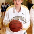 Bentonville’s Jon Koonce eyes the basket while warming up before the start of Friday’s game against ...