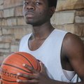 Springdale High junior forward Curtis Evans have been a mainstay for the Red’Dogs this season. His p...