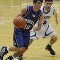 Rogers High’s Wyatt Hively drives past Fayetteville’s Kikko Haydar in the second half Tuesday.