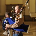 Tom Bercher and Linda Jones play the bagpipes during a rehearsal for the Ozark Highlanders Pipe Band...