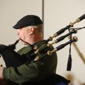 Andrew Burr plays the bagpipes during a rehearsal for the Ozark Highlanders Pipe Band on Thursday.
