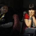 Annabelle Hall from Ramay Junior High School reacts on stage Tuesday after a competitor misspells a ...