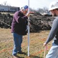 Keith Austin and Joshua Carpenter, both of Keith Austin Construction, work Wednesday on cross sectio...