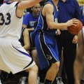 Rogers High’s Casey Caton looks to pass against Fayetteville on Tuesday in Fayetteville.