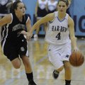 Springdale Har-Ber’s Tori Scott, right, dribbles with the ball past Fayetteville’s Clair Childers du...