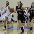 Fayetteville’s Clair Childress races downcourt ahead of Springdale Har-Ber’s Summer Morgan during Fr...