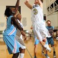 Bentonville’s Grant Higgins shoots over Fort Smith Southside’s Cameron Adams on Friday in Bentonvill...