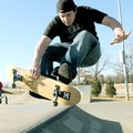 ROLL OUT - Matthew Lucy practices a bean-plant-180 maneuver Thursday at the skate park at Memorial P...