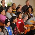 Local members of the Bahá’í Faith perform as a choir during Interfaith Harmony Day on Jan. 17 at St....