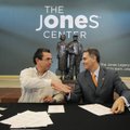 Andres Chao, right, consul general of Mexico based in Little Rock, and Matthew Tronzano, executive d...