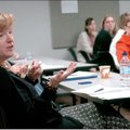 Kameri Christy-McMullin speaks Friday morning to social workers about the information critical to un...