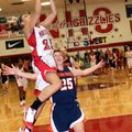 Fort Smith Northside’s Chauntel Terry scores against Rogers Heritage’s Danielle Schillinger on Frida...