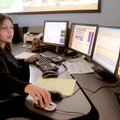 COLD CALLS - Cynthia Garcia, Benton County Central Communications dispatcher, views information on m...