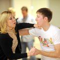 Hannah Mhoon and Jeff Leupold sing along with the music during a swing dance class Jan. 9.