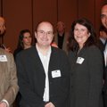 Dr. John Agwunobi, from right, visits with Mechelle and Jack Sinclair and Dr. Malcolm Hayward at the...