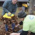 TEAM EFFORT - Angelic Neisen, right, an EKG tech, and Steve Goss, physician executive, work Saturday...