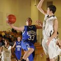 Rogers’ Nick Wary shoots over Bentonville Black center Nick Smith during the second half Thursday at...
