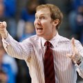 Arkansas Coach John Pelphrey directs his team during the second half Saturday against Kentucky in Le...