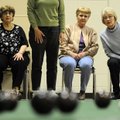 BOWLING BYSTANDERS - Donna Senesac, from left, Clydean Lowery and Harlene Meyer watch as Connie Knaf...